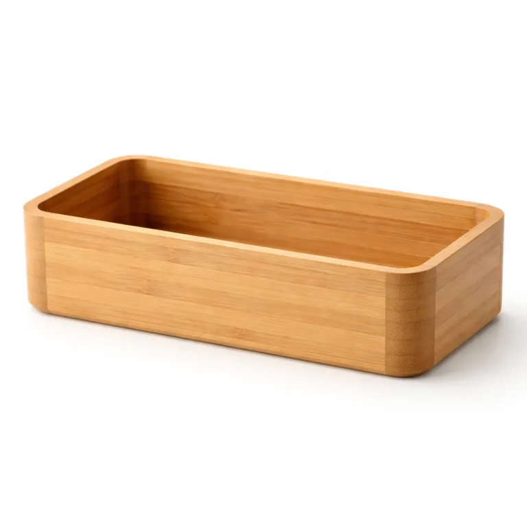 A natural bamboo bathroom organizer basket featuring a smooth rectangular shape and rounded corners for a softer, modern touch. The finish highlights the bamboo's authentic grain and keeps the organizer looking fresh and clean.