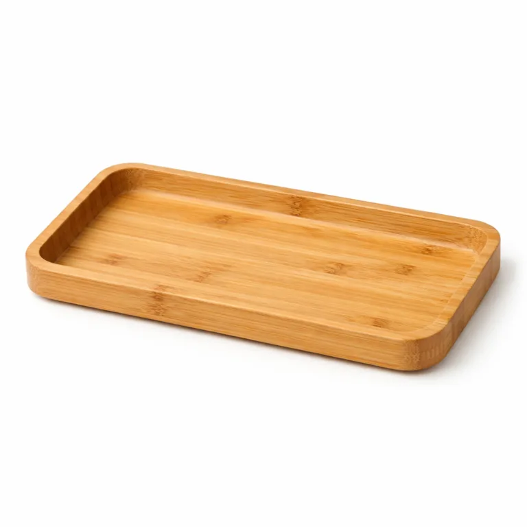 This variant showcases the Bamboo Desk Catchall Tray in a natural bamboo finish with gently rounded edges for comfort and a sleek appearance. Ideal for minimalist desktop organization.