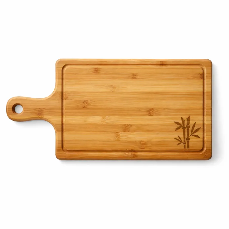 Studio shot of a bamboo cutting board in matte-oiled finish, featuring a handle, elegant logo engraving, and a practical juice groove along the perimeter.