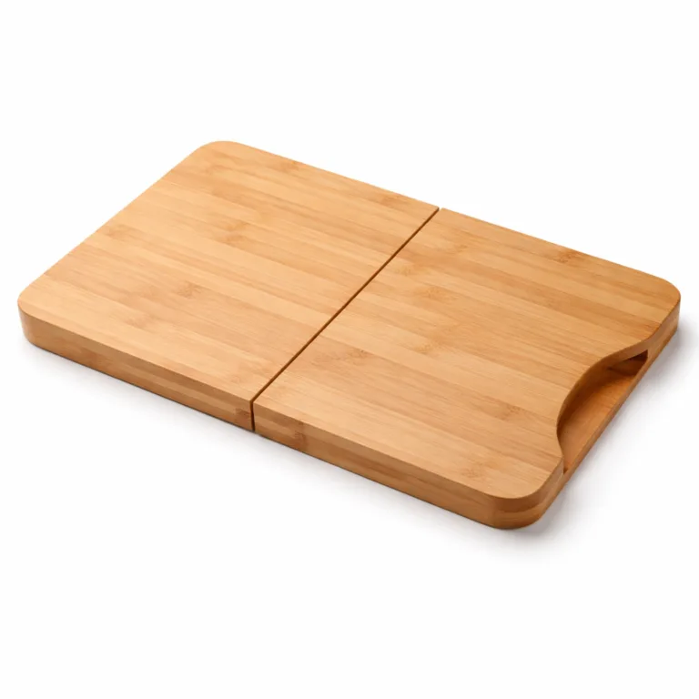 A natural finish bamboo folding cutting board featuring a foldable rectangular design and an integrated pour spout. Crafted from moso bamboo with smooth rounded corners, shown in crisp studio lighting suitable for e-commerce.