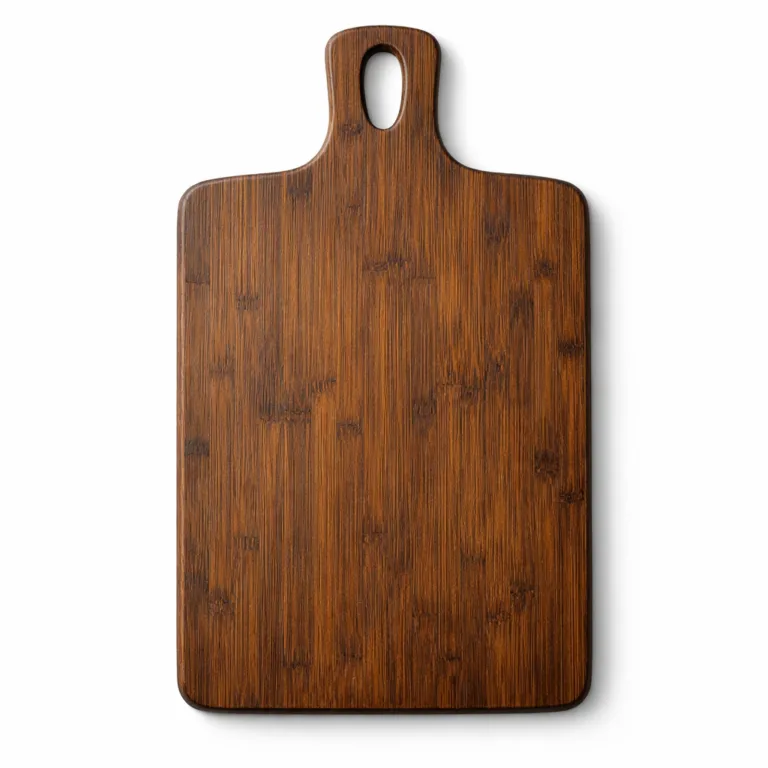 This bamboo cutting board showcases a rich, darkened carbonized finish for a unique look. The board remains rectangular with rounded edges and a cut-out handle for easy hanging.