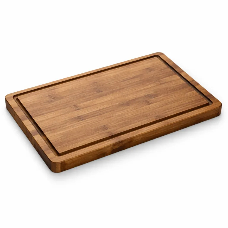 A bamboo cutting board crafted from carbonized bamboo, featuring a rich darker tone, pronounced deep juice groove, and stylish beveled edge profile for added elegance and comfort.
