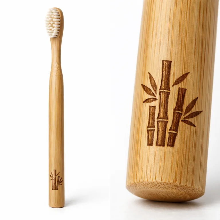 A bamboo toothbrush featuring a natural matte finish, round handle, and close-up of a laser-engraved logo. The product stands out against a white studio background, emphasizing the eco-friendly material and finely detailed engraving.