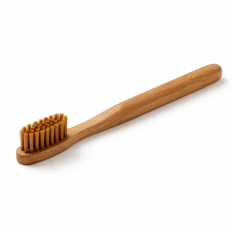 A medium bristle bamboo toothbrush in a classic straight style, featuring a carbonized bamboo handle for a deeper, warm brown appearance. A sophisticated eco-friendly oral care option.
