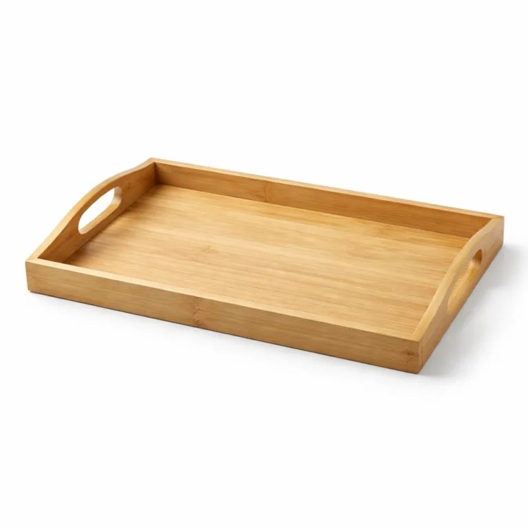 A minimal, rectangular bamboo tray crafted from natural moso bamboo and designed with built-in side handles for easy carrying. The tray’s soft, smooth edges complement its simple form.