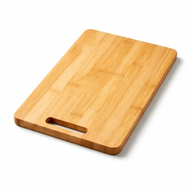 This reversible bamboo chopping board features a discrete handle slot integrated into one edge for easy portability and storage, while maintaining a clean and elegant double-sided design.
