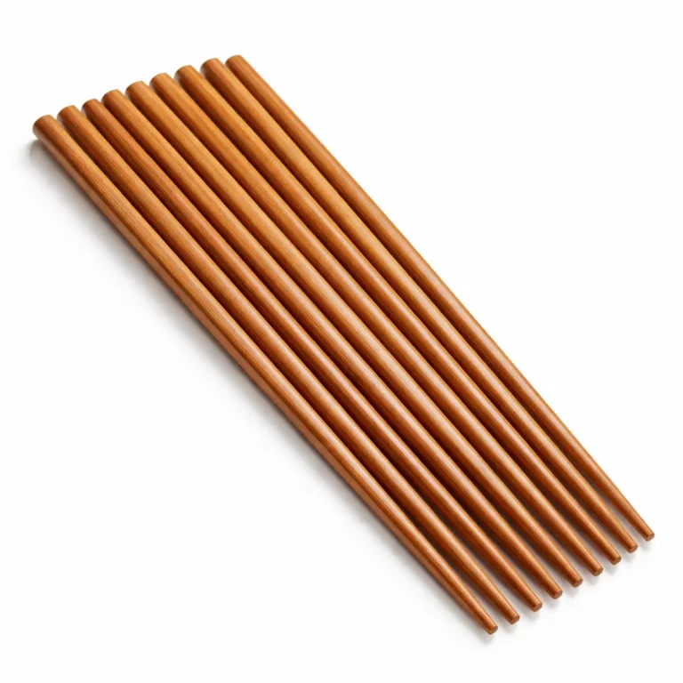 A single bamboo round tip chopstick featuring a carbonized, caramel-brown finish and a gentle gloss, presented on a white studio background for clear e-commerce display.
