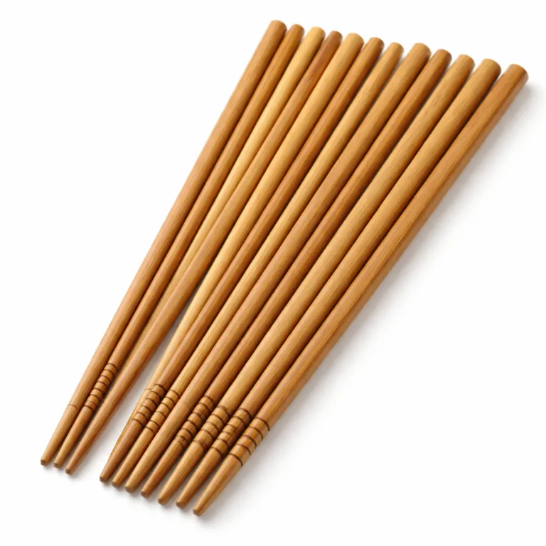 Matte-oiled bamboo round tip chopstick featuring small anti-slip grooves near the tip, captured in high-detail studio lighting on a white background for e-commerce use.