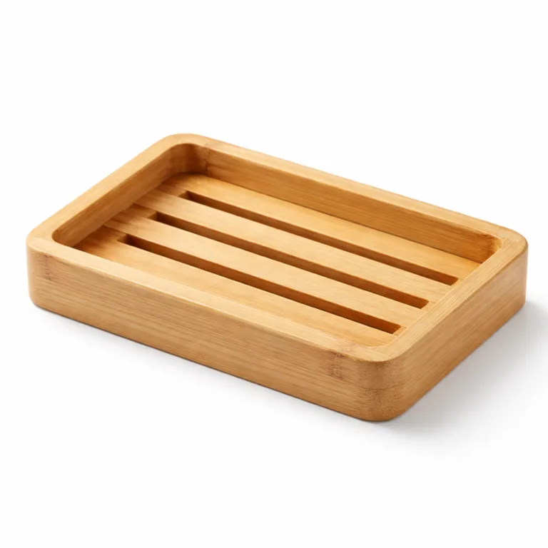 A rectangular natural bamboo soap dish featuring classic parallel slats, a raised protective rim to prevent soap slipping, and a polished smooth surface for a premium look and feel.