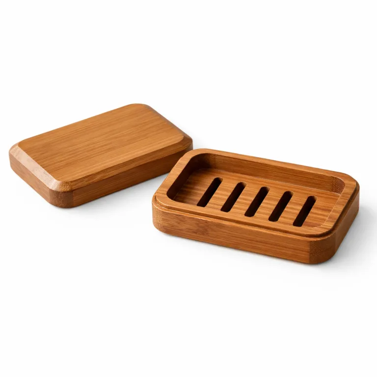 A compact carbonized bamboo soap dish for travel, displaying a rich brown finish and striking beveled edges, combining durability and style.