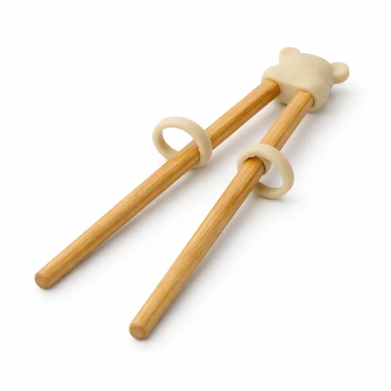 Child-safe bamboo training chopsticks in a natural matte finish, featuring rounded ends for comfortable handling and enhanced safety. Ideal for young learners mastering chopstick use.