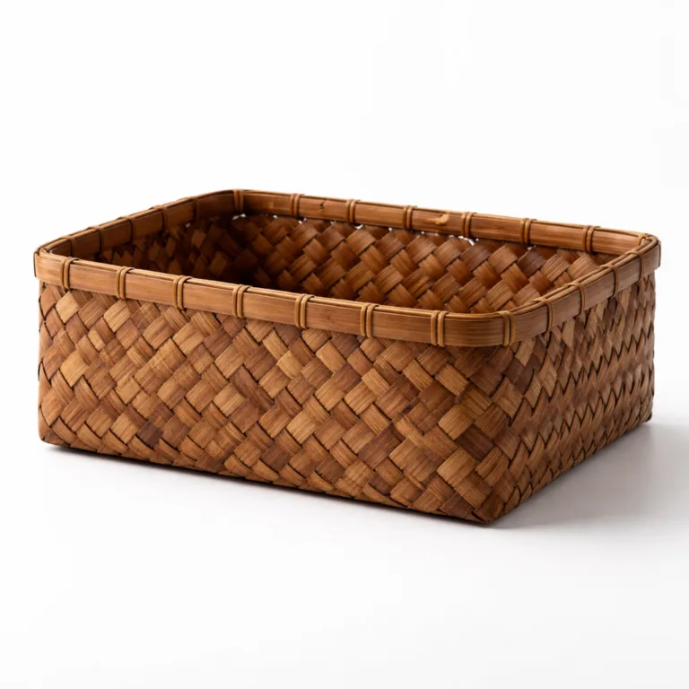 A rectangular bamboo pantry basket with a carbonized finish, lending the woven texture a deep, rich brown color while highlighting the basket's craftsmanship and durability.