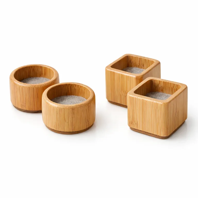 A single bamboo wooden chair leg protector for standard chair legs, shown in a natural finish to highlight the organic wood grain. The item features a gently rounded edge, providing a smooth and elegant appearance. Perfect for furniture protection and modern home décor.