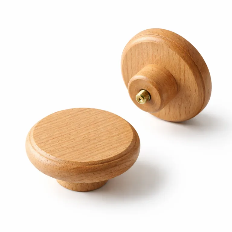 A single round beech wood drawer pull handle, featuring elegantly beveled edges and a refined matte-oiled finish, offering a subtle sheen and modern touch.