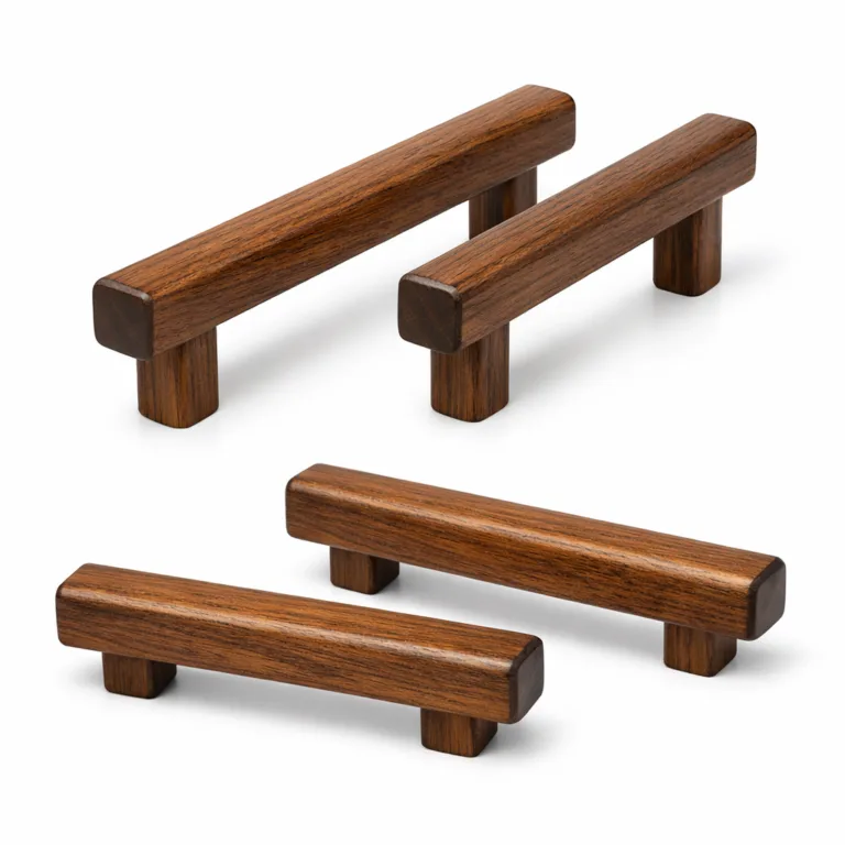 A single bar-shaped drawer pull handle made from beech wood, treated with a carbonized finish. The rich, dark coloring enhances its clean, straight profile.