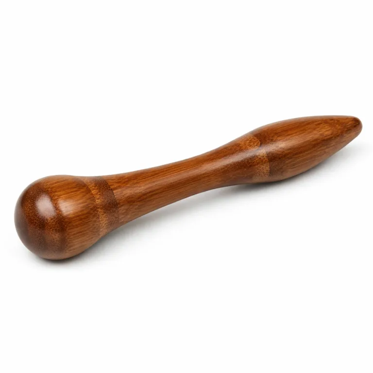 Experience enhanced relaxation with this carbonized bamboo face massage tool, showcasing beveled edges and a smooth polished surface. Durable double-ended design is crafted for effective facial massage, highlighted in sharp, realistic detail.