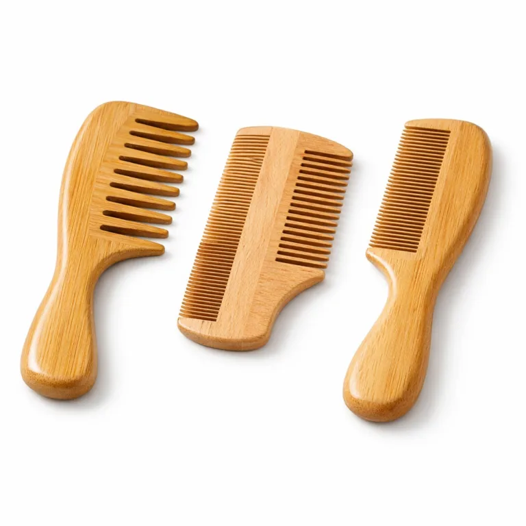 This three-piece grooming comb set is crafted from natural bamboo and beech wood. Each comb features an ergonomic wood handle and distinct tooth styles, beautifully arranged on a clean white studio background.