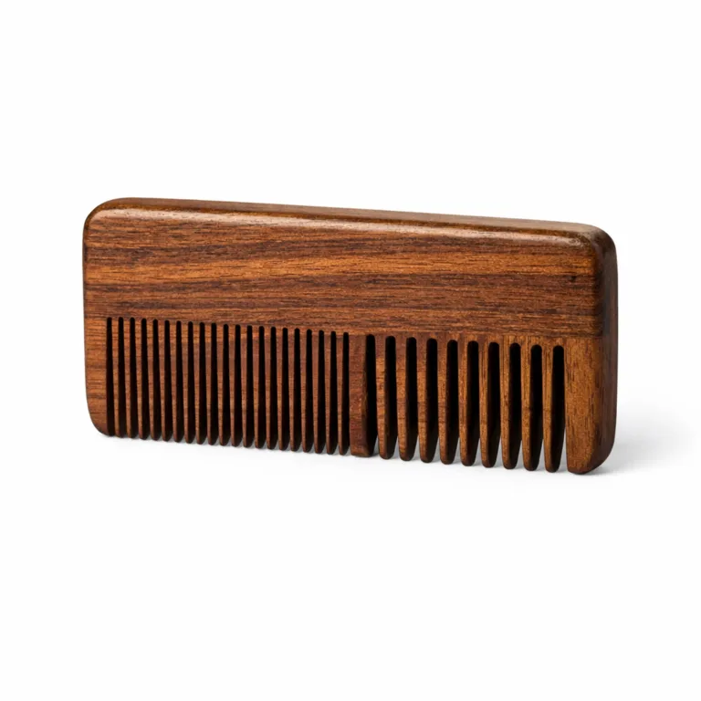 Stylish carbonized beechwood pocket comb featuring a compact rectangular design and enriched dark wood tones, perfect for travel and daily use.