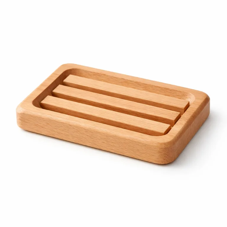 A sleek beech wood slatted soap dish with a refined beveled edge profile, offering a contemporary touch and superior hand-finished surface quality.