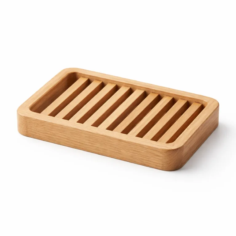 A rectangular beech wood slatted soap dish showcasing a natural finish and carefully rounded corners, highlighting beautiful wood grain and suited for modern bathrooms.