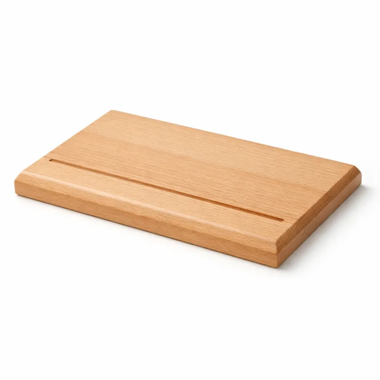 A modern wooden sofa arm tray in natural beech, featuring beveled edges for a refined profile and a slim groove detail to help hold items in place.