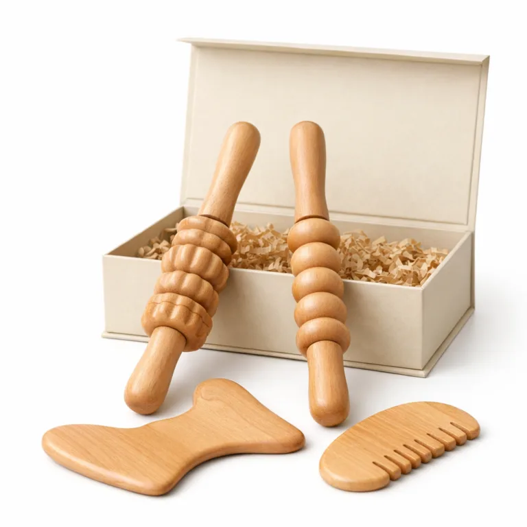 A Wooden Spa Massage Tool Set crafted from beech wood, featuring roller sticks with ergonomic handles and gua sha tools, all finished in a natural matte look with carefully rounded edges for comfortable grip. Presented in a neat gift box, ideal for e-commerce main images.